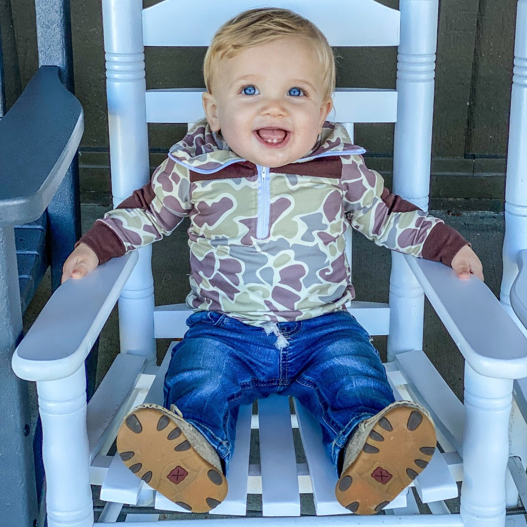 Boys' 'Cute in Camo' Pullover with an old school camo print featuring brown accents on the chest, cuffs, and elbows.