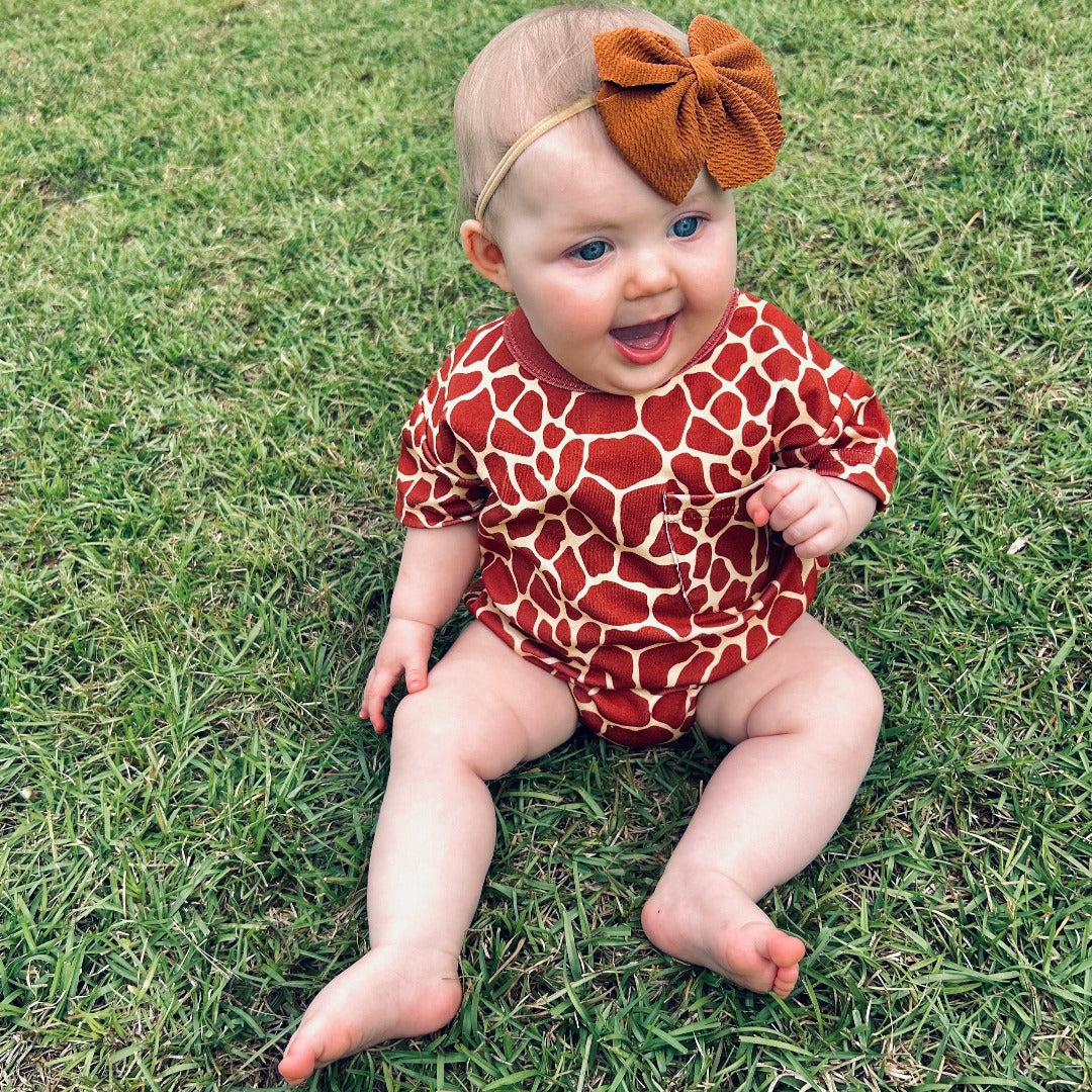 Girls' Stylin' Giraffe Bubble featuring a giraffe animal print onesie..
