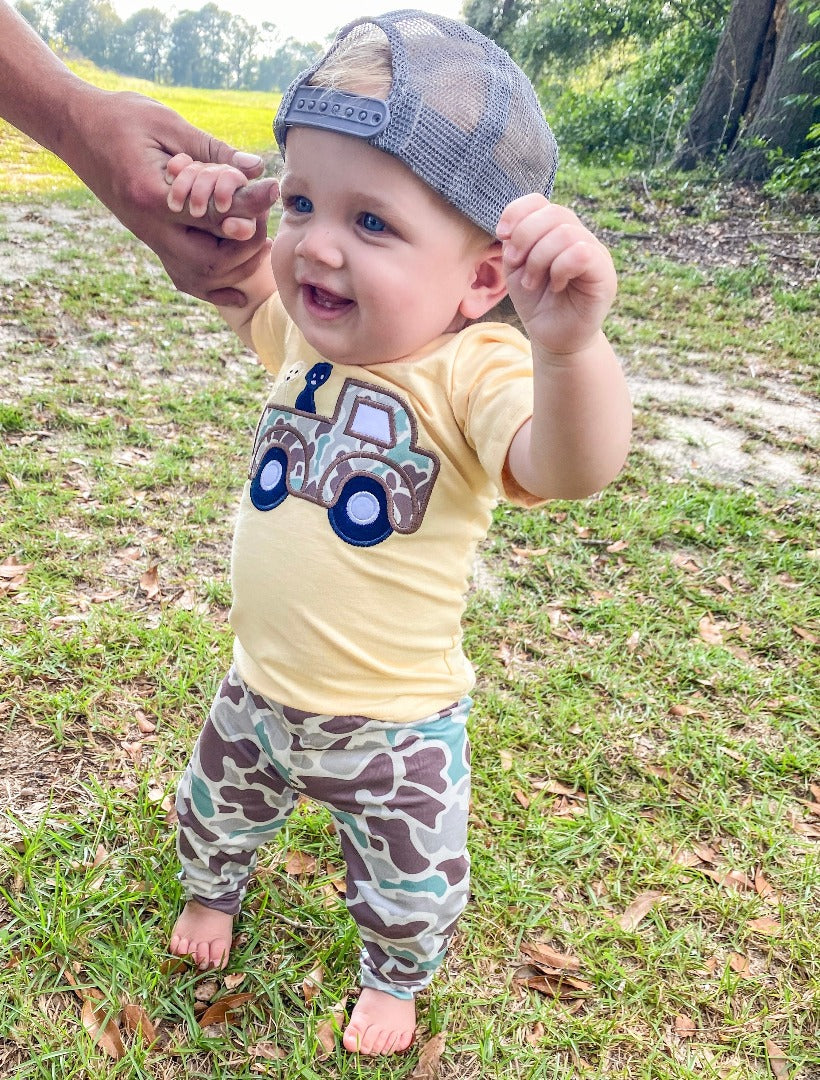 Boys' Hunting Truck Pant Set featuring a yellow short-sleeve shirt with a camo truck and dog design, paired with old school camo pants.