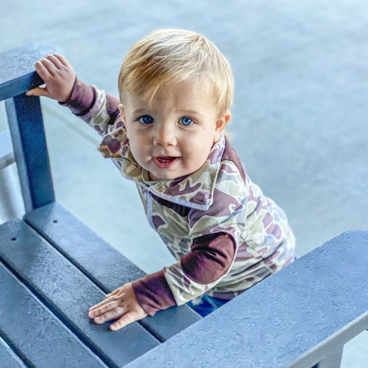 Boys' 'Cute in Camo' Pullover with an old school camo print featuring brown accents on the chest, cuffs, and elbows.